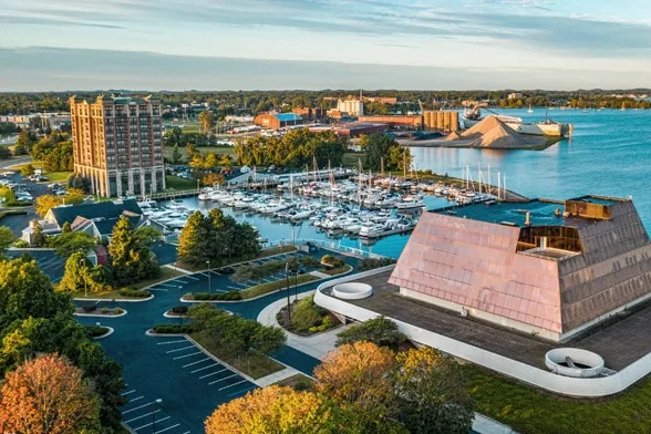 Aerial view of a Muskegon, MI marina and waterfront buildings on Muskegon Lake